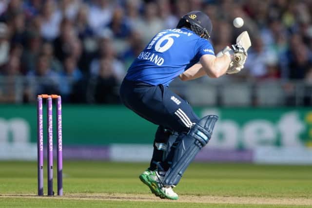 Englands Eoin Morgan retired hurt after being struck on the helmet by a ball from Mitchell Starc. Picture: Getty