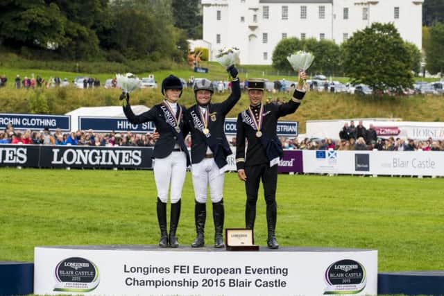 Michael Jung with Sandra Auffarth and Frances Thibaut Vallette. Picture: PA
