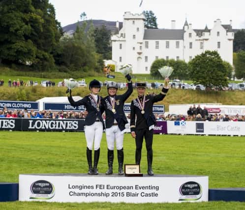 Michael Jung with Sandra Auffarth and Frances Thibaut Vallette. Picture: PA