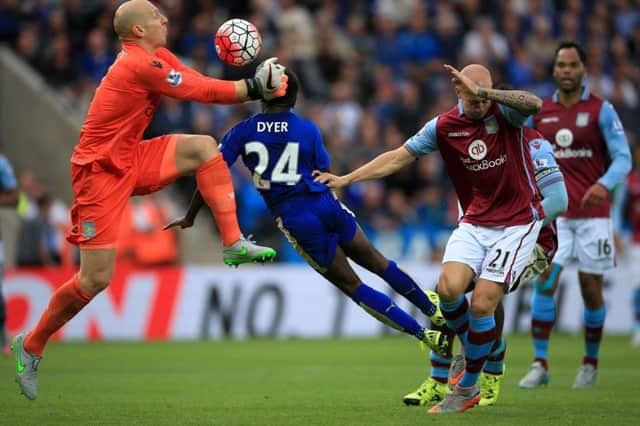 Nathan Dyer clatters into goalkeeper Brad Guzan as he heads home the 89th-minute winner. Picture: PA