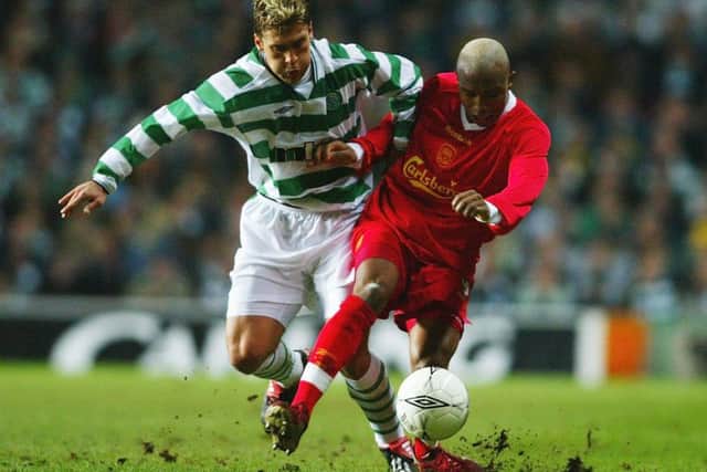 El Hadji Diouf holds off Stiliyan Petrov during the match at Parkhead. Picture: Getty