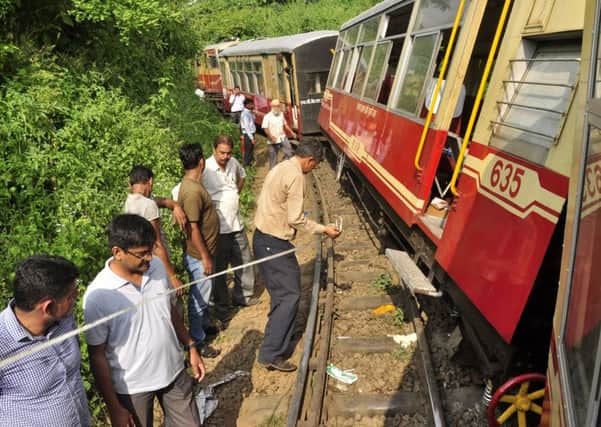 Two British tourists were killed and nine other passengers injured when a train carrying tourists to the hill town of Shimla in northern India derailed. Picture: Getty/AFP
