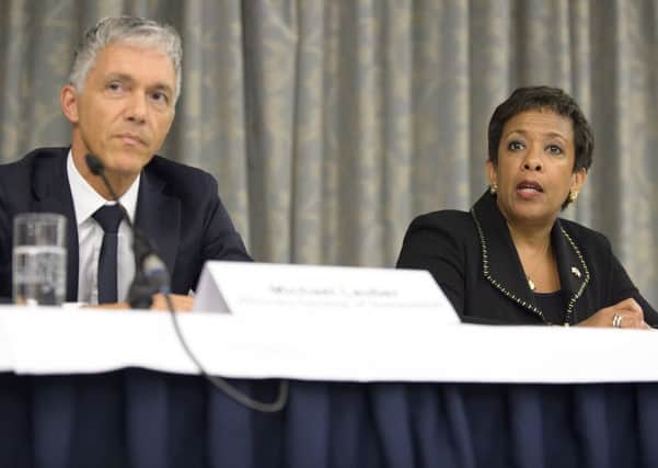 Swiss attorney general Michael Lauber and his US counterpart Loretta Lynch. Picture: AP