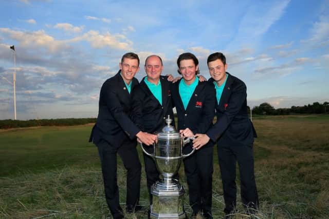 Victorious Great Britain & Ireland Walker Cup captain Nigel Edwards, second from left and the Scots members of his team, Grant Forrest, left, Ewen Ferguson, second from right, and Jack McDonald. Picture: David Cannon/R&A/Getty