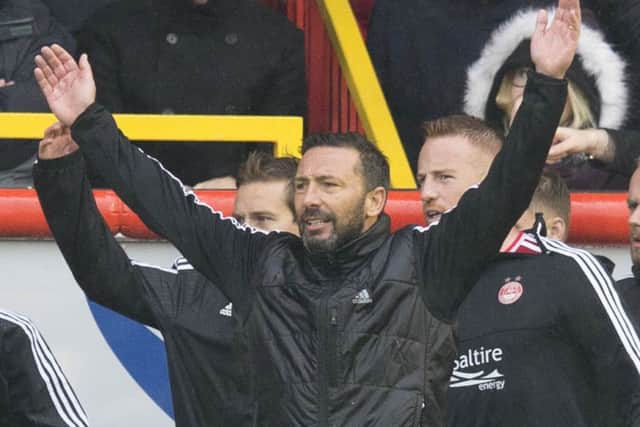 Aberdeen manager Derek McInnes shortly before the final whistle in Saturday's 2-1 win over Celtic. Picture: PA