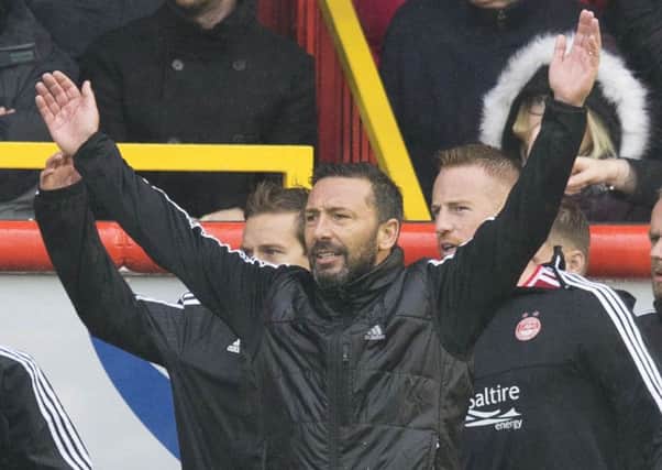 Aberdeen manager Derek McInnes shortly before the final whistle in Saturday's 2-1 win over Celtic. Picture: PA