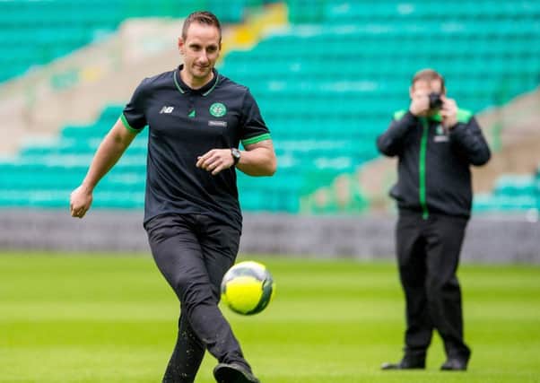 John Kennedy takes part in the crossbar challenge with Britains Davis Cup team yesterday. Picture: SNS