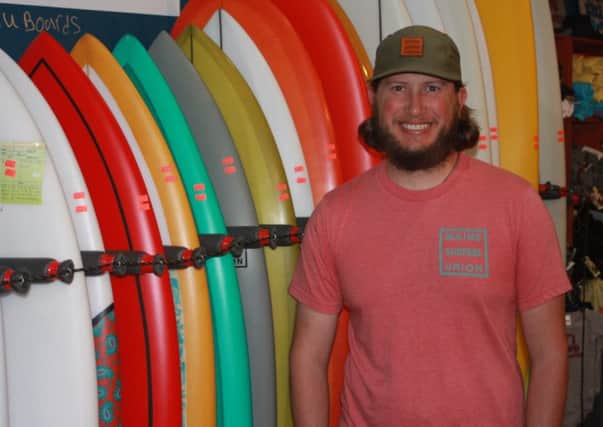 Charlie Fox, owner of Maine Surfers Union surf shop in Portland, Maine. Picture: Roger Cox