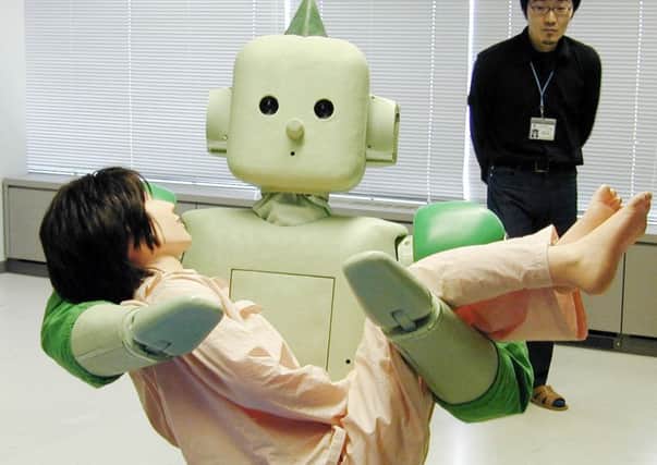 Work on developing robots to serve in the health and care industries is ongoing. Picture: AFP/Getty