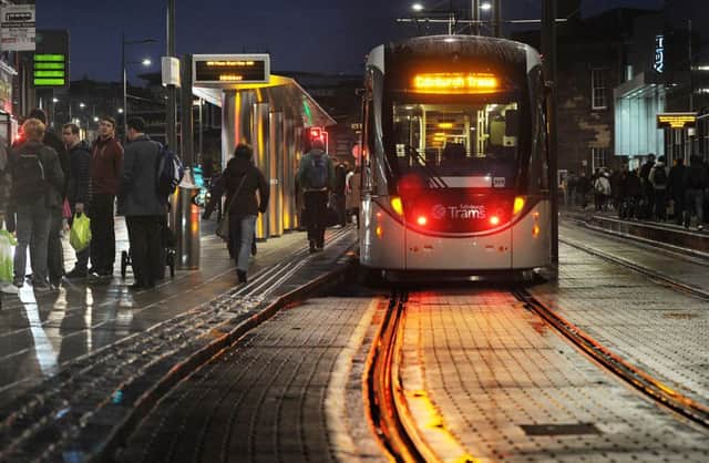 Early morning commuters and air passengers will have earlier trams to the airport for a trial period next month. Picture: Neil Hanna