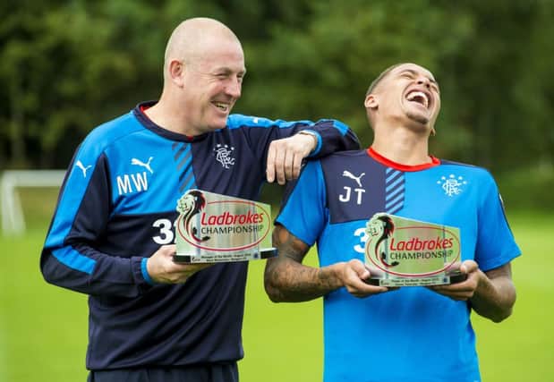 Mark Warburton, left, and James Tavernier with their awards. Picture: SNS