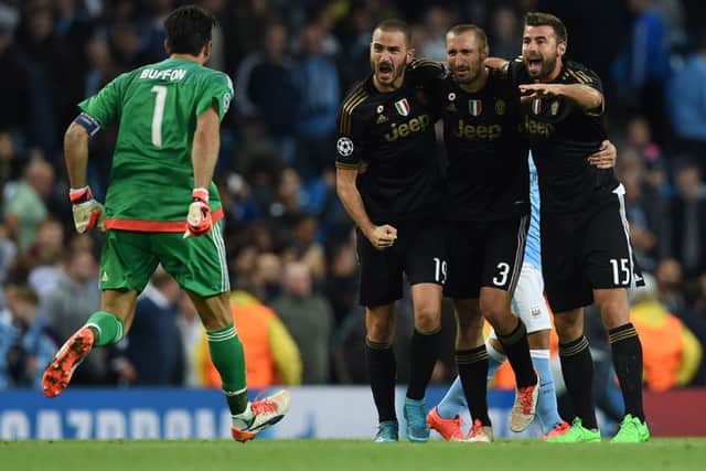 The Juventus players celebrate after winning at the Etihad. Picture: AFP/Getty