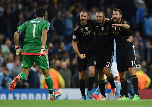 The Juventus players celebrate after winning at the Etihad. Picture: AFP/Getty