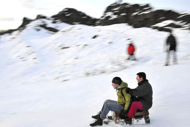 The snowed over hills provide many people with hours of fun