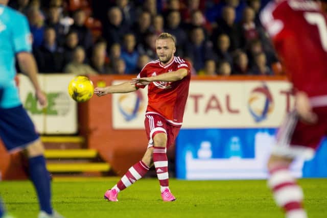 Ryan McLaughlin made his Aberdeen debut in Tuesday's hard-fought win over Hamilton. Picture: SNS