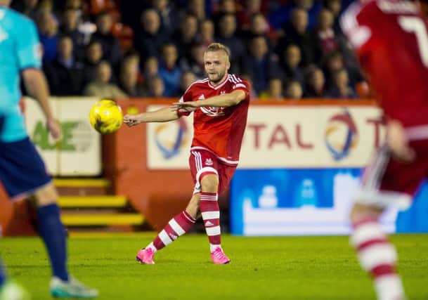 Ryan McLaughlin made his Aberdeen debut in Tuesday's hard-fought win over Hamilton. Picture: SNS