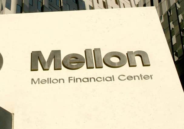 Walter Scott's parent company is Bank of New York Mellon. Andrew Rush/AP