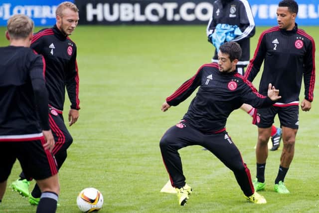 Mike van der Hoorn, Amin Younes and Ricardo van Rhijn of Ajax take part in a training session. Picture: Getty
