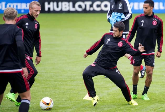 Mike van der Hoorn, Amin Younes and Ricardo van Rhijn of Ajax take part in a training session. Picture: Getty