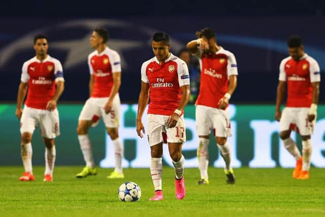 Alexis Sanchez of Arsenal looks dejected after the second Dinamo Zagreb goal. Picture: Getty