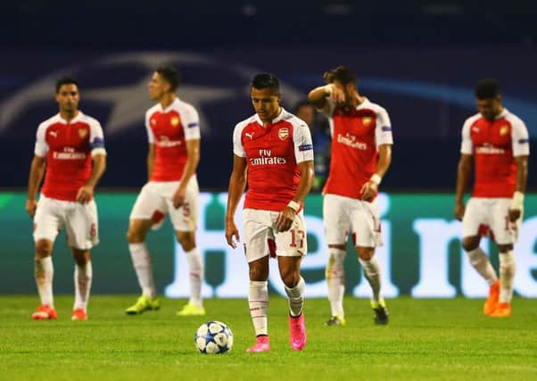 Alexis Sanchez of Arsenal looks dejected after the second Dinamo Zagreb goal. Picture: Getty