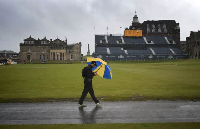 Play was suspended due to heavy rain ahead at this summer's Open Championship. Picture: Jane Barlow
