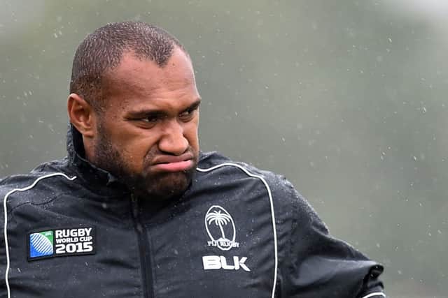 Fijis Nemani Nadolo doesnt seem to be enjoying the weather at a training session in London. Picture: Getty