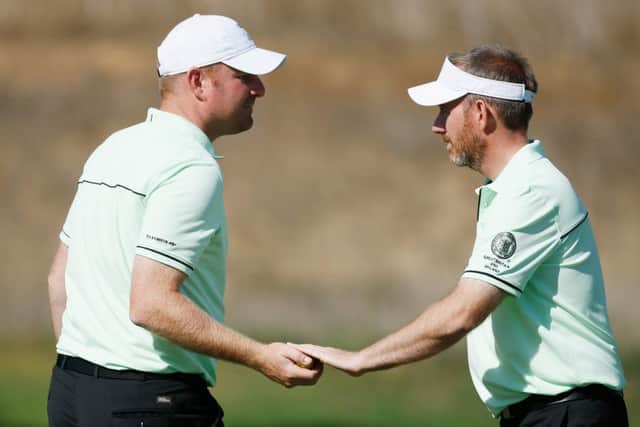 SAN MARTIN, CA - SEPTEMBER 17:  Gareth Wright (L) and Graham Fox of the Great Britain & Ireland team wait on a green during a practice session prior to the start of the 27th PGA Cup at CordeValle on September 17, 2015 in San Martin, California.  (Photo by Scott Halleran/Getty Images)