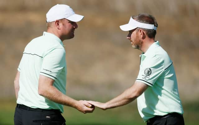SAN MARTIN, CA - SEPTEMBER 17:  Gareth Wright (L) and Graham Fox of the Great Britain & Ireland team wait on a green during a practice session prior to the start of the 27th PGA Cup at CordeValle on September 17, 2015 in San Martin, California.  (Photo by Scott Halleran/Getty Images)