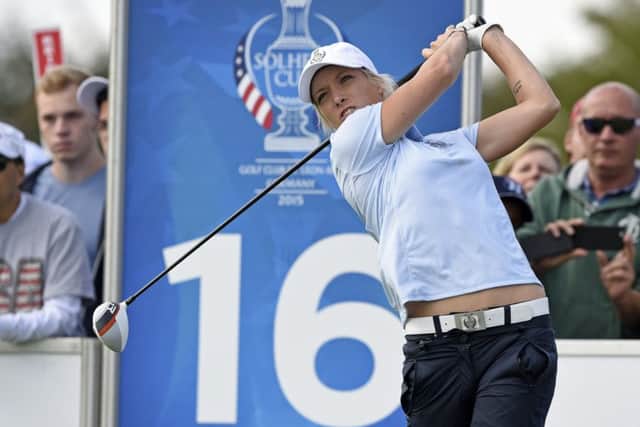 Europes Melissa Reid tees off during the foursomes on the first day of the Solheim Cup. Picture: AP