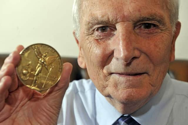 Peter Heatly, with his Commonwealth Games gold medal, in 2011. Picture: Dan Phillips
