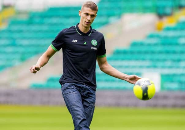 Jozo Simunovic could have been helping Dinamo Zagreb beat Arsenal but is happy with his decision to join Celtic. Picture: SNS