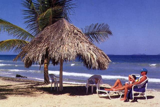 Thomas Cook is likely to have benefited from holidaymakers getting away from the UKs wet August weather when it posts an update next week. Picture: Contributed