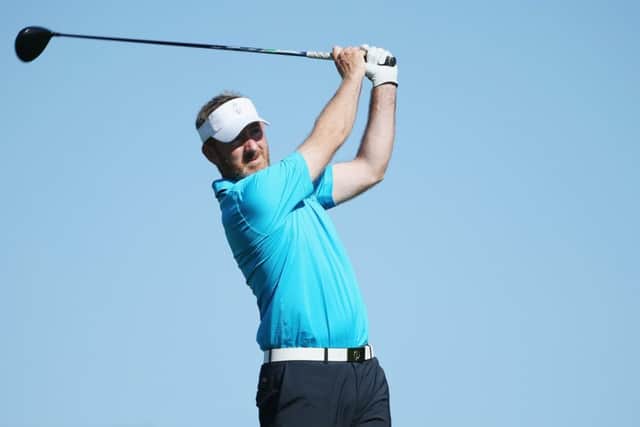 SAN MARTIN, CA - SEPTEMBER 18:   Graham Fox of the Great Britain & Ireland team hits a tee shot on the ninth hole during the Friday Four-Ball matches at the 27th PGA Cup at CordeValle on September 18, 2015 in San Martin, California.  (Photo by Scott Halleran/Getty Images)
