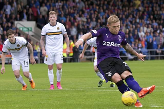 Rangers' Martyn Waghorn scores from the penalty spot at Dumbarton. Picture: PA