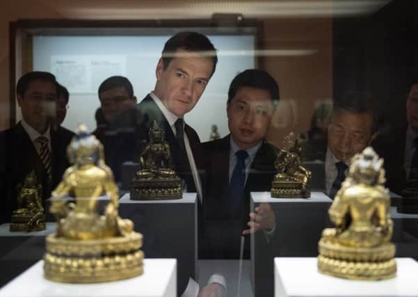 Chancellor George Osborne tours the National Museum in Beijng where he viewed Chinese antiquities. Picture: PA