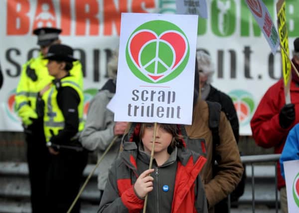A young anti-Trident protestor in April. Picture: Jane Barlow