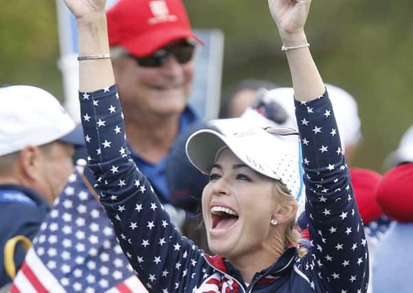 USAs Paula Creamer celebrates after clinching the Solheim Cup. Picture: AP