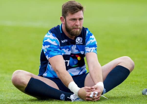 Scotland flanker Ryan Wilson stretches off after a training session. Picture: SNS Group