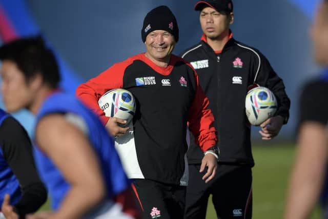 Japan's head coach Eddie Jones (centre) attends a training session in Brighton. Picture: AFP/Getty Images