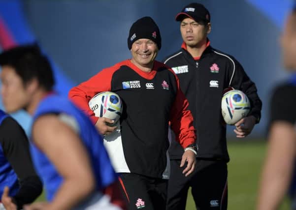 Japan's head coach Eddie Jones (centre) attends a training session in Brighton. Picture: AFP/Getty Images