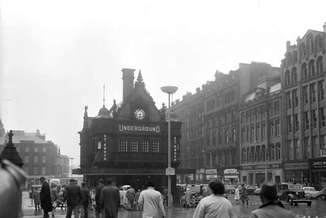 Passengers rush to St Enoch underground station in August 1962. The railway station was on the left.