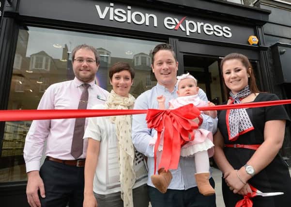 Vision Express Edinburgh officially opens its new store  with a special guest from the
Childhood Eye Cancer Trust (CHECT)