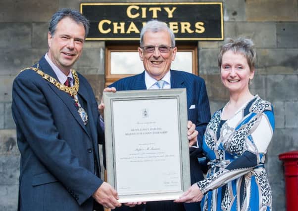Lord Provost Donald Wilson and Su Millar present Stephen Seaman with his award. Picture: Ian Georgeson