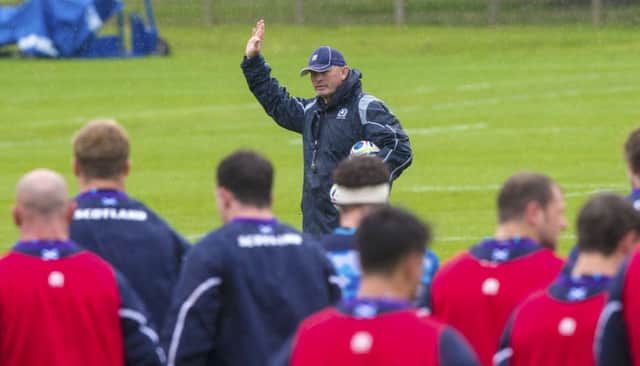 Scotland head coach Vern Cotter takes charge of training at his squad's Gloucester base yesterday as they prepare for tomorrow's clash with Japan. Picture: Gary Hutchison/SNS
