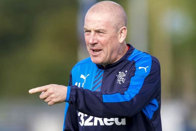 Mark Warburton says silverware would be a big lift for fans. Picture: SNS