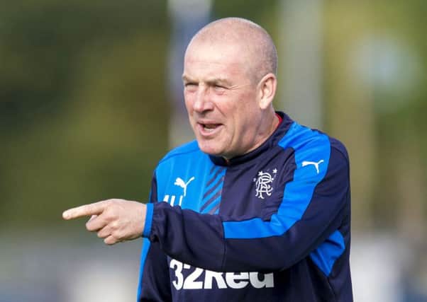 Mark Warburton says silverware would be a big lift for fans. Picture: SNS