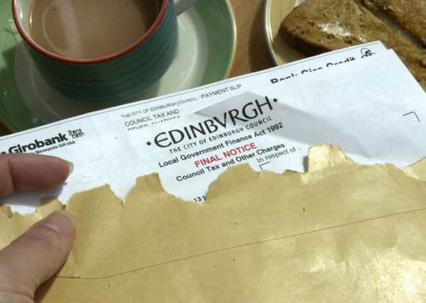 A freeze on council tax has led to local authorities being 'overfunded' according to a new report. Picture: TSPL