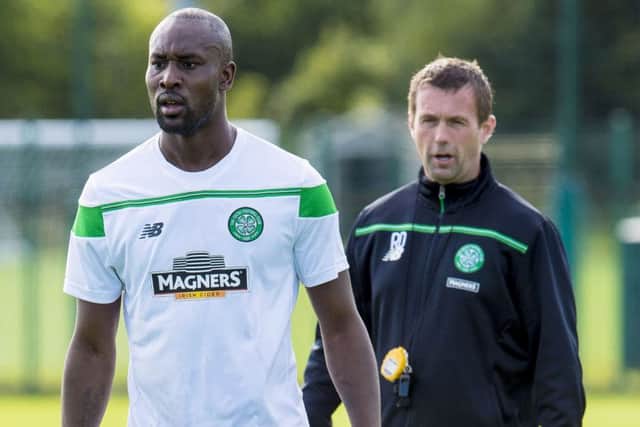 Celtic manager Ronny Deila keeps a watchful eye on Carlton Cole during training yesterday. Picture: SNS
