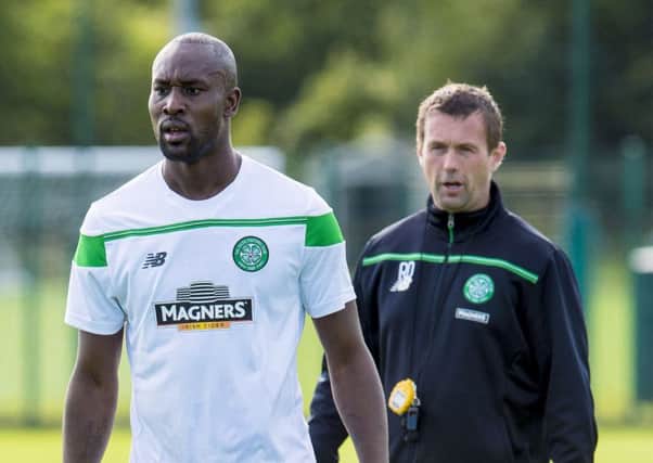 Celtic manager Ronny Deila keeps a watchful eye on Carlton Cole during training yesterday. Picture: SNS